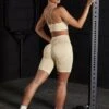 Seamless High Waist Biker Shorts In Beige 1 Seamless High Waist Biker Shorts In Beige -Sculpt Sets Body BT0465 7 BT0462 Streamline Resilience Beige Biker Short Cross Back Sports Bra