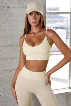 Seamless Scoop Neck Sports Bra In Ivory 12 Seamless Scoop Neck Sports Bra In Ivory -Sculpt Sets Body BT0574 4 Determination Ivory Scoop Neck Sports Bra 4346a02c aa8c 43cd a881 7d84cc8fdd7f