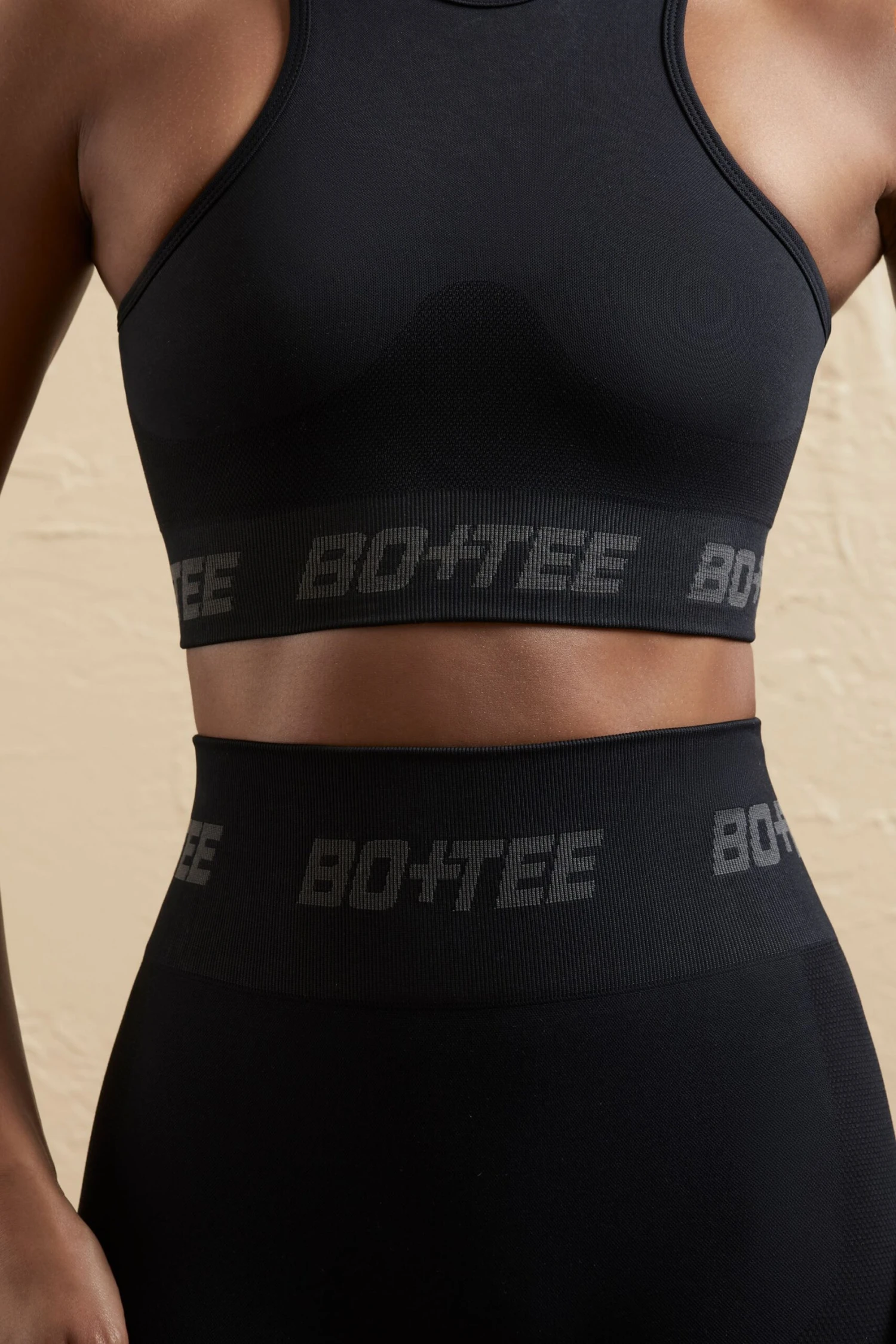 Seamless Racerback Crop Top In Black 6 Seamless Racerback Crop Top In Black - Image 4