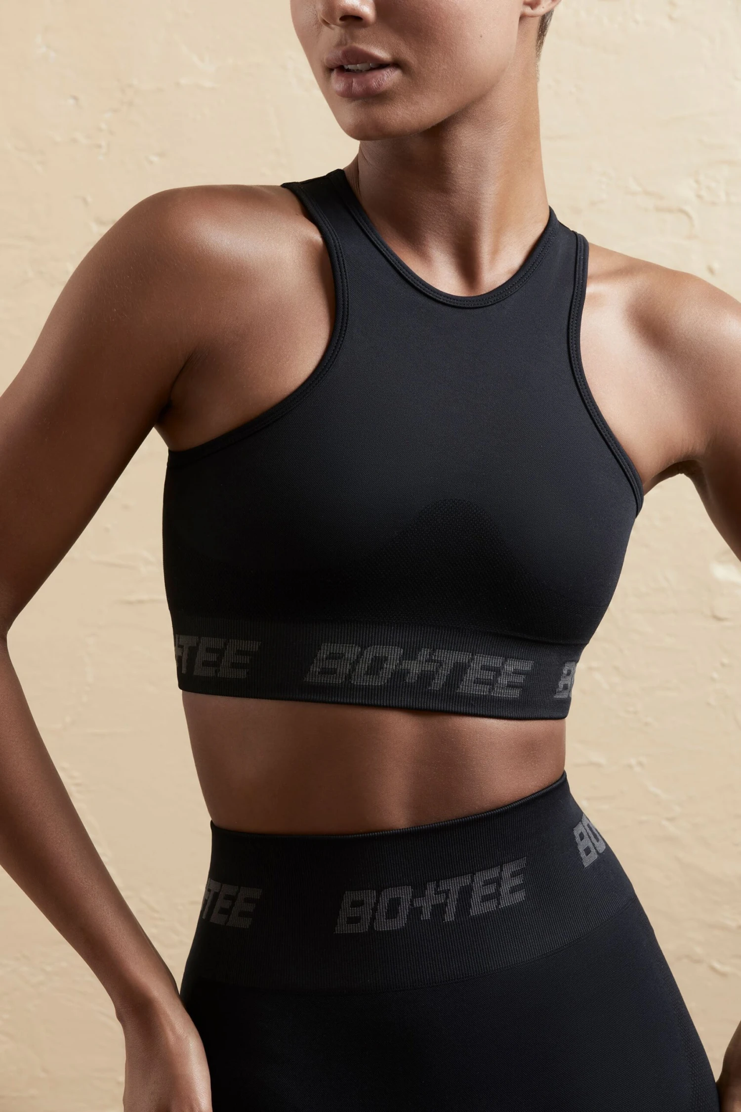 Seamless Racerback Crop Top In Black 8 Seamless Racerback Crop Top In Black - Image 6