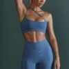 Asymmetric Neckline Sports Bra In Blue -Sculpt Sets Body BT0600 BT0607 2 Enhance Robust Blue Cross Over Sports Bra Cycling Shorts a6796021 57e0 4a18 8c51 15f6471fef2b