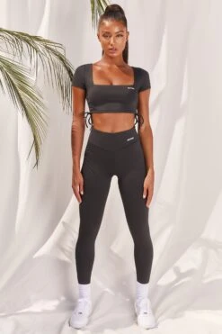 Slinky Crop Top In Black 9 Slinky Crop Top In Black -Sculpt Sets Body bt0008 bt0009 1 black short sleeved side tied bust flattering crop top high waisted leggings two piece workout sportswear d9b5005c 0307 4301 8cea fb2d840a9327