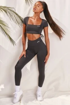 Slinky Crop Top In Black 10 Slinky Crop Top In Black -Sculpt Sets Body bt0008 bt0009 3 black short sleeved side tied bust flattering crop top high waisted leggings two piece workout sportswear 6c15e58f 084b 4d9b a4fc 89310a3ab848