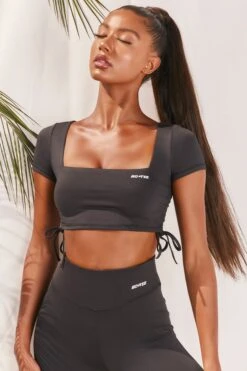 Slinky Crop Top In Black 12 Slinky Crop Top In Black -Sculpt Sets Body bt0008 bt0009 5 black short sleeved side tied bust flattering crop top high waisted leggings two piece workout sportswear