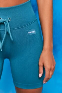 On Repeat Ribbed Tie Front Cycling Shorts In Teal -Sculpt Sets Body bt0100 bt0105 5 shape on repeat teal racer back sports bra high wasit tie front cycling shorts sportswear set