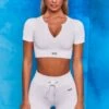 Results Ribbed Tie Front Mini Shorts In White 2 Results Ribbed Tie Front Mini Shorts In White -Sculpt Sets Body bt0102 bt0104 1 perform results white ribbed zip short sleeve crop tshirt crop top shorts drawstring two piece set 1