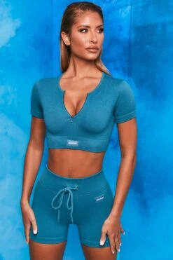 Results Ribbed Tie Front Mini Shorts In Teal -Sculpt Sets Body bt0102 bt0104 2 perform results teal zip front short sleeve crop top tie front shorts sportswear set 1