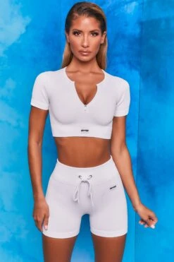 Results Ribbed Tie Front Mini Shorts In White 12 Results Ribbed Tie Front Mini Shorts In White -Sculpt Sets Body bt0102 bt0104 2 perform results white ribbed zip short sleeve crop tshirt crop top shorts drawstring two piece set 1