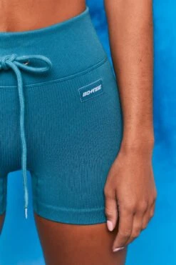 Results Ribbed Tie Front Mini Shorts In Teal -Sculpt Sets Body bt0102 bt0104 8 perform results teal zip front short sleeve crop top tie front shorts sportswear set