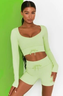 Time Check Ribbed Long Sleeve Crop Top In Lime 12 Time Check Ribbed Long Sleeve Crop Top In Lime -Sculpt Sets Body bt0301 bt0306 2 move it time check lime high waist draw string ribbed cycle shorts long sleeved strap crop top 2