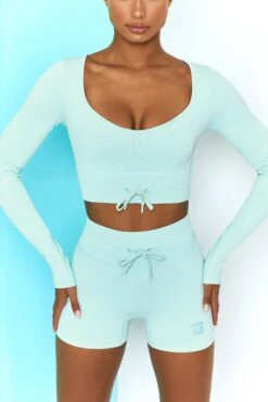 Time Check Ribbed Long Sleeve Crop Top In Light Blue -Sculpt Sets Body bt0301 bt0306 4 move it time check light blue long sleeved strap crop top tie front shorts ribbed pastel