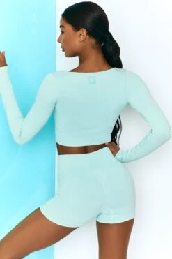 Time Check Ribbed Long Sleeve Crop Top In Light Blue -Sculpt Sets Body bt0301 bt0306 6 move it time check light blue long sleeved strap crop top tie front shorts ribbed pastel