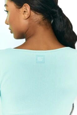 Time Check Ribbed Long Sleeve Crop Top In Light Blue -Sculpt Sets Body bt0301 bt0306 7 move it time check light blue long sleeved strap crop top tie front shorts ribbed pastel