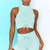 Ribbed Tie Front Mini Shorts In Light Blue 2 Ribbed Tie Front Mini Shorts In Light Blue -Sculpt Sets Body bt0305 bt0301 3 miles ahead move it light blue ribbed work out crop top high waist draw string ribbed cycle shorts