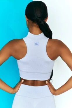 Miles Ahead Ribbed High Neck Crop Top In Cool Blue 10 Miles Ahead Ribbed High Neck Crop Top In Cool Blue -Sculpt Sets Body bt0305 bt0318 7 miles ahead cool blue ribbed sleeveless turtle neck draw string crop top long distance ribbed draw string shorts