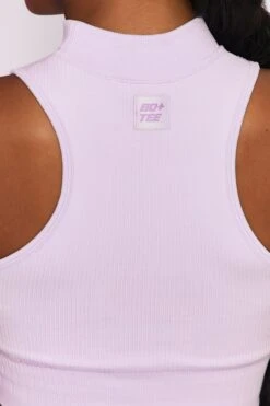 Miles Ahead Ribbed High Neck Crop Top In Lilac 11 Miles Ahead Ribbed High Neck Crop Top In Lilac -Sculpt Sets Body bt0305 bt0318 7 miles ahead lilac ribbed sleeveless turtle neck draw string crop top long distance ribbed draw string shorts 2