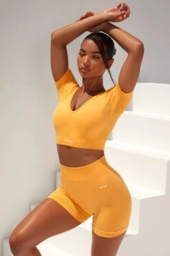 Curved Waist Seamless Mini Shorts In Light Orange