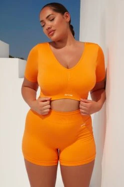 Curved Waist Seamless Mini Shorts In Orange -Sculpt Sets Body bt0361 bt0366 9 gradient flash orange scrunch sportswear set 3