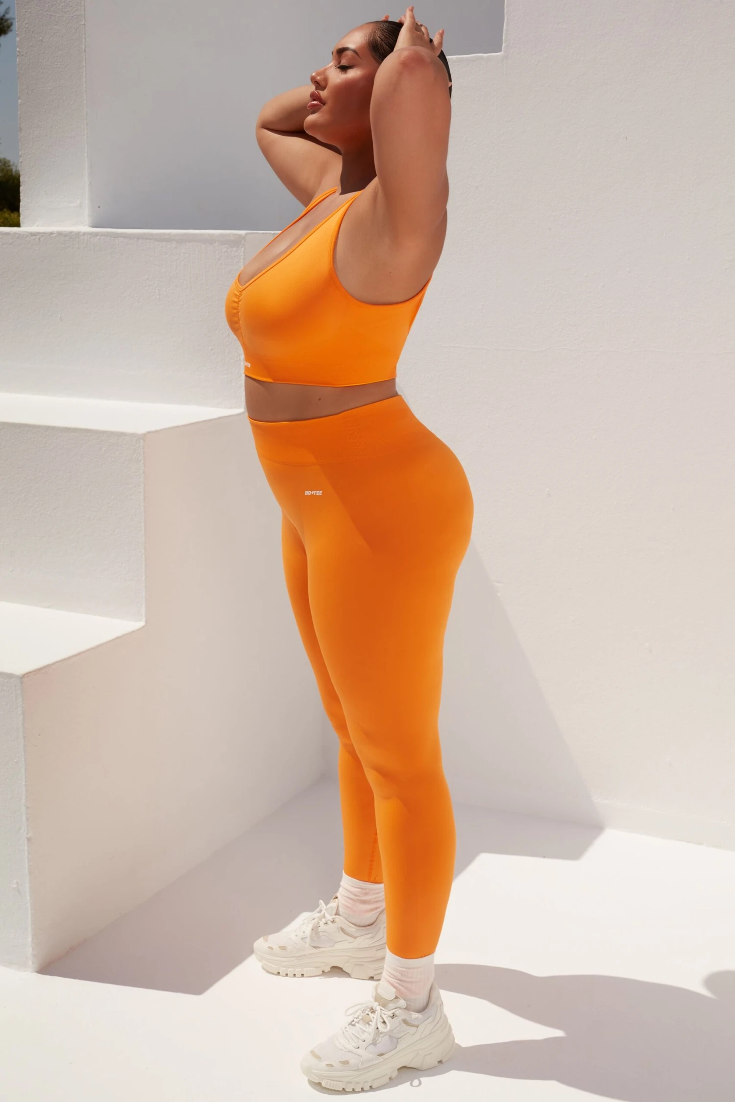 Surge Curved Waist Seamless Leggings In Orange 5 Surge Curved Waist Seamless Leggings In Orange - Image 3
