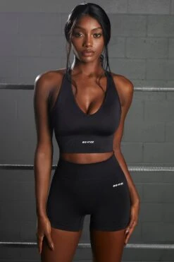 Racer Knot Back Seamless Crop Top In Black 12 Racer Knot Back Seamless Crop Top In Black -Sculpt Sets Body bt0366 bt0372 1 flash overhaul black scoop neck crop top shorts seamless sportswear 1